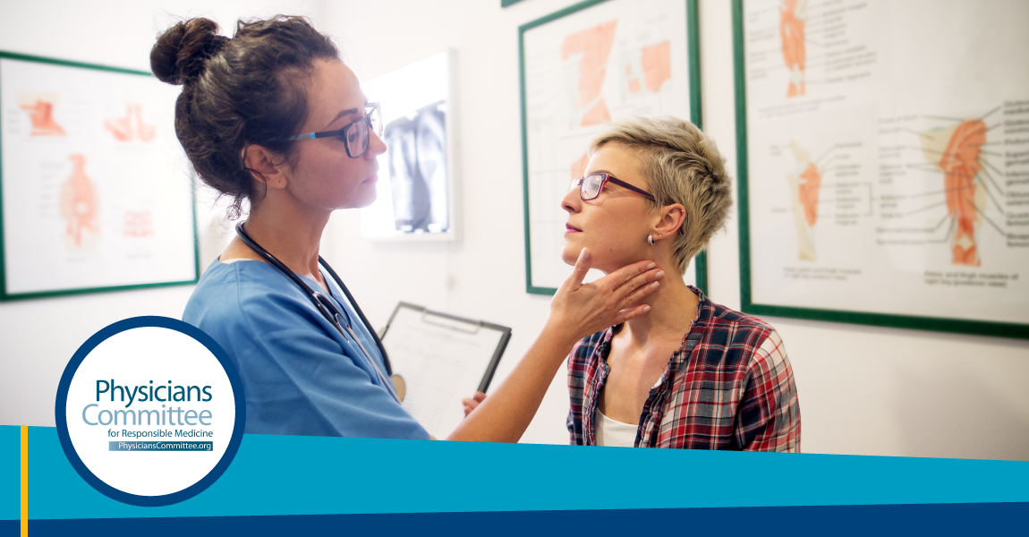 Physician helping patient